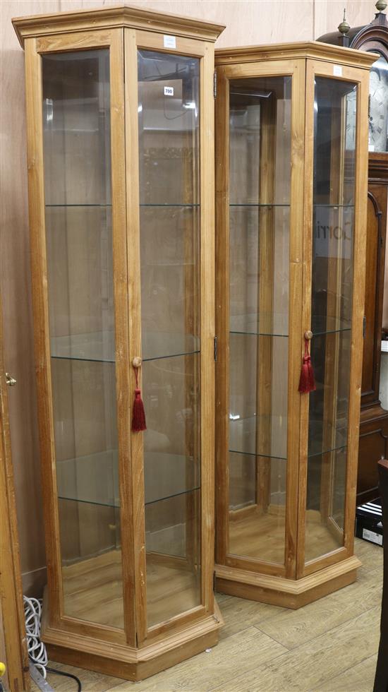A pair of beech framed hexagonal display cabinets with four shelves W.72cm